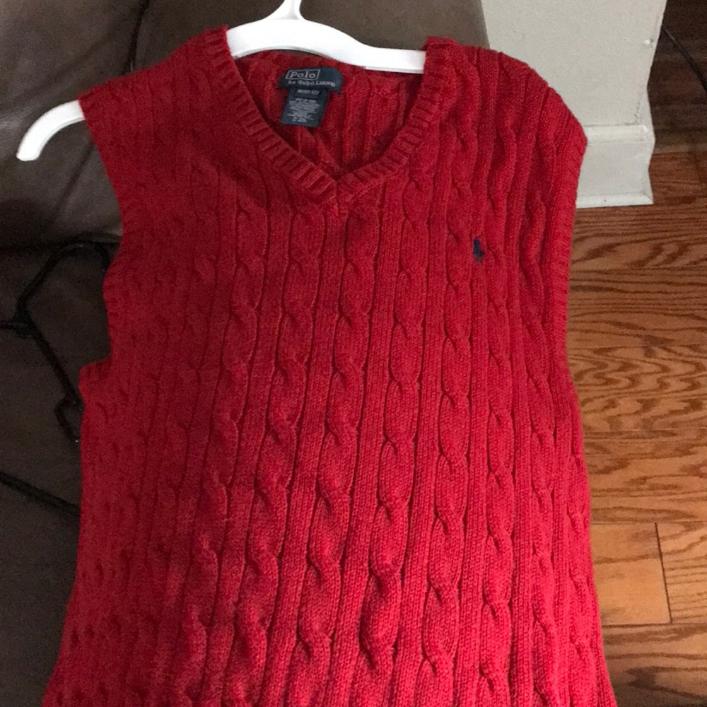 Polo red vest.
